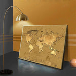 Tableau carte du monde or et sable.