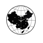 Horloge monde en métal continent