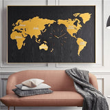 Horloge murale carte du monde noire et dorée